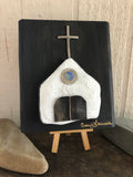 White stone Chapel on Salvage Wood