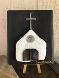 White stone Chapel on Salvage Wood