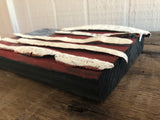 American Flag on Driftwood
